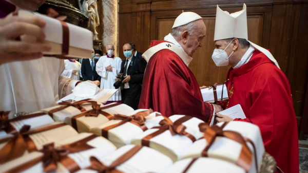 Pope Francis distributes palliums after celebrating Mass on the feast of Sts. Peter and Paul in St. Peter's Basilica at the Vatican June 29, 2021. (CNS photo/Vatican Media)