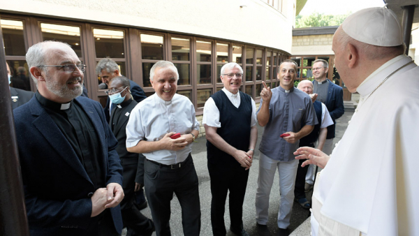 Pope Francis talks with members of the Society of Jesus at the apostolic nunciature in Bratislava, Slovakia, Sept. 12, 2021. During a private meeting, the pope spoke to the Jesuits about his health, the pastoral work of Jesuits in Slovakia, and how he deals with suspicions or criticisms. (CNS photo/Vatican Media)