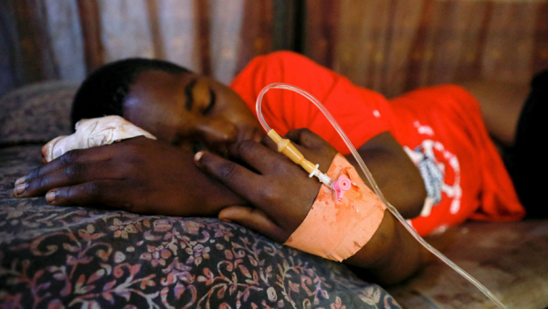 Adetunji Henry, 15, one of the victims of the attack by gunmen during Pentecost Mass at St. Francis Xavier Church, receives treatment at the Federal Medical Centre in Owo, Nigeria, June 6, 2022. Reports said at least 50 people were killed in the attack. (CNS photo/Temilade Adelaja, Reuters)