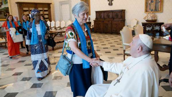 Maria Lia Zervino, an Argentine who is president of the World Union of Catholic Women's Organizations, greets Pope Francis June 11, 2022, during a meeting in the library of the Apostolic Palace at the Vatican. The Vatican announced July 13 that the pope had named Zervino to be a member of the Dicastery for Bishops. (CNS photo/Vatican Media)