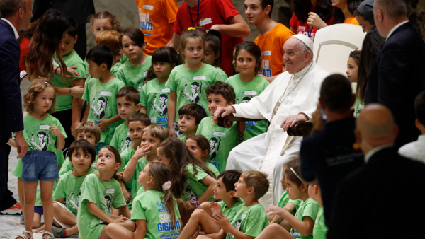 Pope Francis meets children during his general audience in the Paul VI hall at the Vatican Aug. 3, 2022. (CNS photo/Paul Haring)