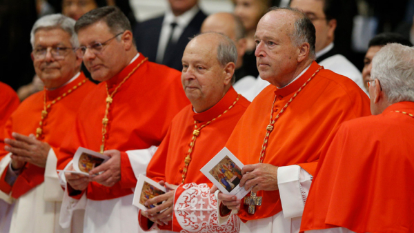 New U.S. Cardinal Robert W. McElroy of San Diego, right, and other new cardinals attend a consistory led by Pope Francis for the creation of 20 new cardinals in St. Peter's Basilica at the Vatican Aug. 27, 2022. (CNS photo/Paul Haring)