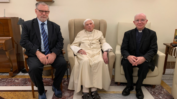 Retired Pope Benedict XVI is pictured with Ratzinger prize winners Joseph H. H. Weiler, a professor of law at New York University School of Law, and Jesuit Father Michel Fédou, professor of dogmatic theology and patristics at the Centre Sèvres of Paris, at the Mater Ecclesia monastery at the Vatican Dec. 1, 2022. (CNS photo/courtesy Joseph Ratzinger-Benedict XVI Vatican Foundation)