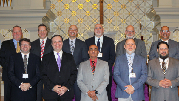 Bishop calls 11 men to candidacy for permanent diaconate