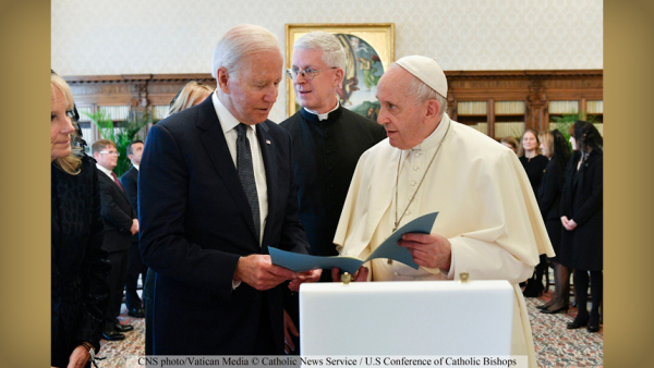 Pope Francis gives one of his documents to U.S. President Joe Biden during a meeting at the Vatican in this file photo from Oct. 29, 2021. The pope gives visiting heads of state copies of his major texts. (CNS photo/Vatican Media)