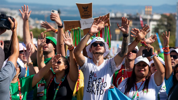 Young people eagerly await Pope Francis on the streets of Lisbon, Portugal