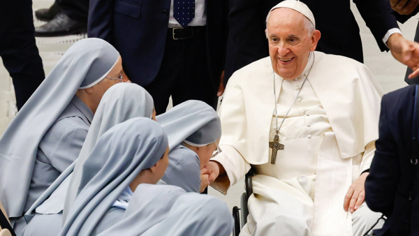 Pope Francis greets members of the Sister Disciples of Jesus in the Eucharist at the end of a meeting in the Paul VI Audience Hall at the Vatican Aug. 25, 2023. (CNS photo/Lola Gomez)