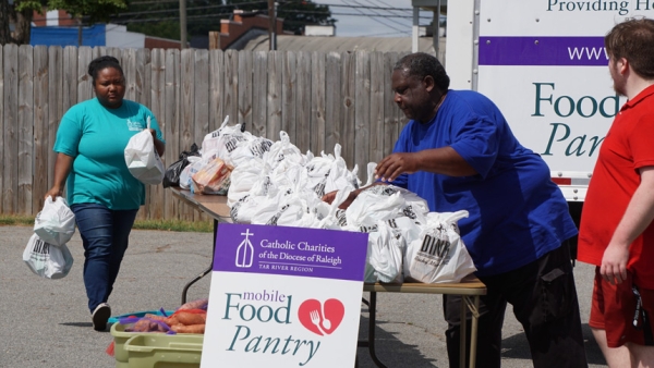 Catholic Charities campaign highlights neighbors helping neighbors