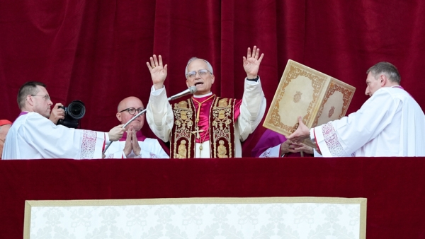Pope Leo XIV, the former Cardinal Robert F. Prevost, delivers his blessing "urbi et orbi" (to the city and the world) from the central balcony of St. Peter's Basilica at the Vatican after his election as pope May 8, 2025. The new pope was born in Chicago. (CNS photo/Lola Gomez)