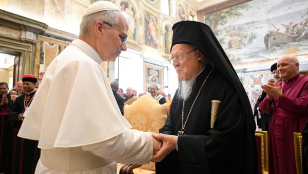 Pope Leo XIV greets Orthodox Ecumenical Patriarch Bartholomew of Constantinople during a meeting with religious leaders at the Vatican, May 19, 2025. The leaders had come to Rome for the pope's inauguration Mass. (CNS photo/Vatican Media)