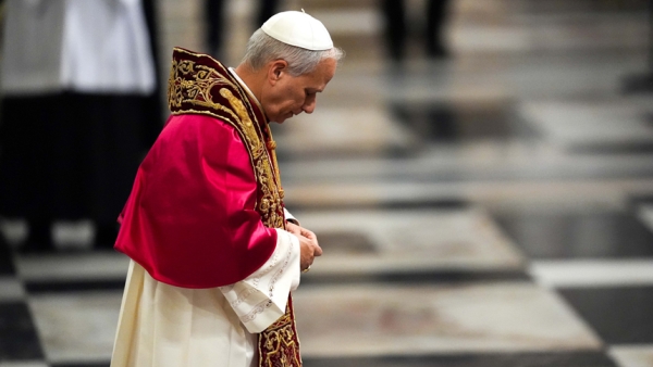 Pope Leo XIV prays in front of the tomb of St. Paul during a visit to the Basilica of St. Paul Outside the Walls in Rome May 20, 2025. (CNS photo/Lola Gomez)