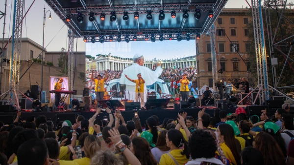A band performs in front of an image of Pope Leo XIV displayed on a large screen during a festival in Risorgimento Square in Rome July 29, 2025, as part of the Jubilee of Digital Missionaries and Catholic Influencers. (CNS photo/Pablo Esparza)