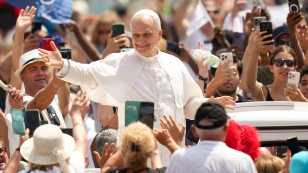 Pope Leo XIV greets people as he rides in the popemobile in St. Peter’s Square after celebrating Mass for the conclusion of the Jubilee of Sport in St. Peter’s Basilica at the Vatican June 15, 2025. (CNS photo/Lola Gomez)