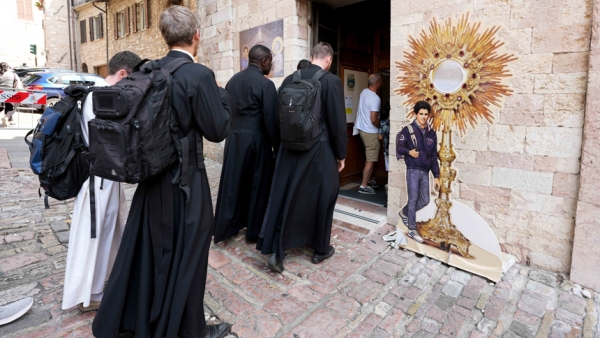 Seminarians enter the Shrine of the Renunciation, where Blessed Carlo Acutis is buried, in Assisi, Italy, Aug. 21, 2025. Acutis who died in 2006, will be canonized Sept. 7 at the Vatican by Pope Leo XIV. (CNS photo/Lola Gomez)