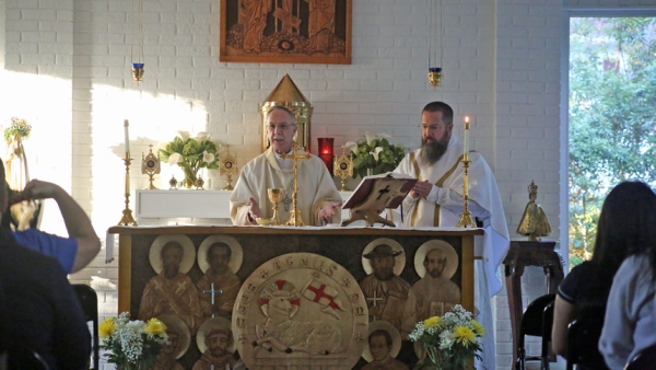 'One foot in Heaven': Bishop inspires students during visit to ECU Newman Center