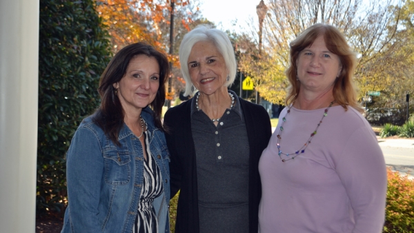 Kathy Schultz (center) meets with ministry members Christine Dennis from Holy Name of Jesus Cathedral (left) and Paula Hils (right) from St. Mary Magdalene Parish.