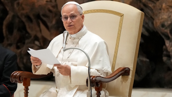 Pope Leo XIV talks to pilgrims and visitors during his weekly general audience in the Paul VI Audience Hall at the Vatican Jan. 28, 2026. (CNS photo/Lola Gomez)