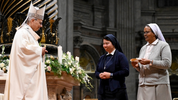 Pope Leo XIV receives the offertory gifts during Mass with consecrated women and men marking the feast of the Presentation of the Lord and the World Day for Consecrated Life in St. Peter's Basilica at the Vatican, Feb. 2, 2026. (CNS photo/Vatican Media)