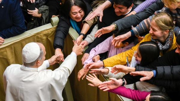 Pope Leo XIV greets people at the conclusion of his weekly general audience in the Paul VI Audience Hall at the Vatican Feb. 4, 2026. (CNS photo/Vatican Media)
