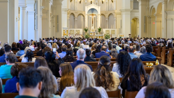 Diocese of Raleigh faithful listen to Bishop Luis Zarama's homily at the 2026 Chrism Mass.