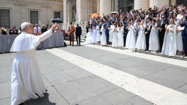 Pope Leo XIV greets newly married couples at St. Peter’s Square at the Vatican after his weekly general audience June 24, 2026. (CNS photo/Vatican Media)
