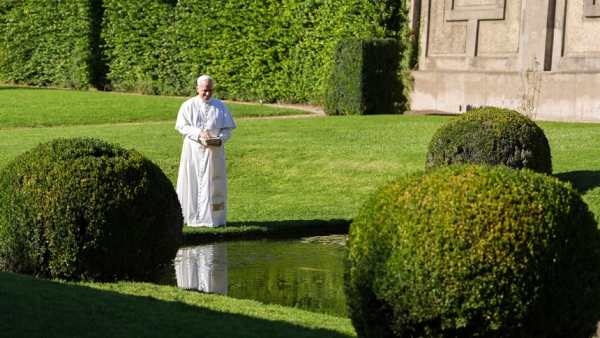 Pope Leo XIV feeds fish at a pond in the Pontifical Gardens of Castel Gandolfo, Italy, Sept. 5, 2025. The Vatican released Pope Leo's message for the World Day of Prayer for the Care of Creation which will be celebrated Sept. 1. (CNS photo/Lola Gomez)