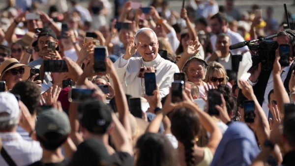 Pope Leo XIV greets visitors and pilgrims from the popemobile while riding around St. Peter’s Square at the Vatican before his weekly general audience Sept. 2, 2026. (CNS photo/Lola Gomez)