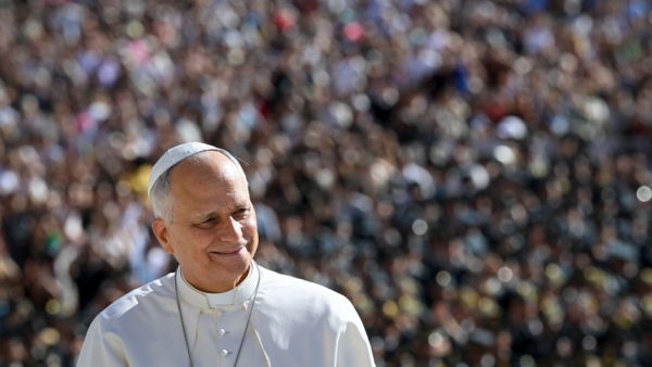 Pope Leo XIV smiles from the popemobile while riding around St. Peter’s Square at the Vatican before his weekly general audience Sept. 23, 2026. (CNS photo/Vatican Media)