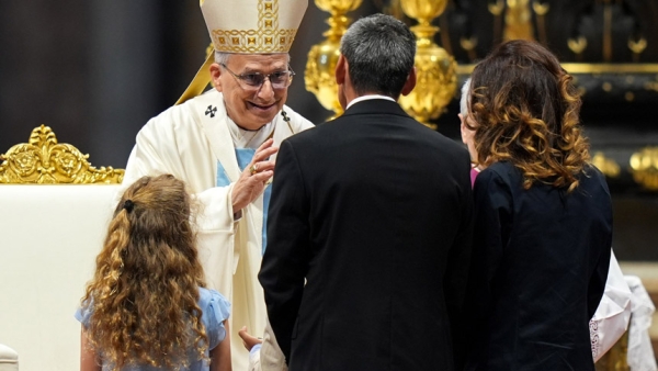 A family presents the offertory gifts to Pope Leo XIV during Mass marking the Jubilee of the Holy See in St. Peter’s Basilica at the Vatican June 9, 2025. (CNS photo/Lola Gomez)