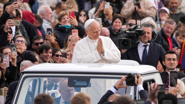 Pope Leo XIV smiles from the popemobile while riding around St. Peter’s Square at the Vatican before his weekly general audience Oct. 28, 2026. (CNS photo/Lola Gomez)